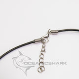 close-up of the leather cord for the shark tooth pendant in silver 
